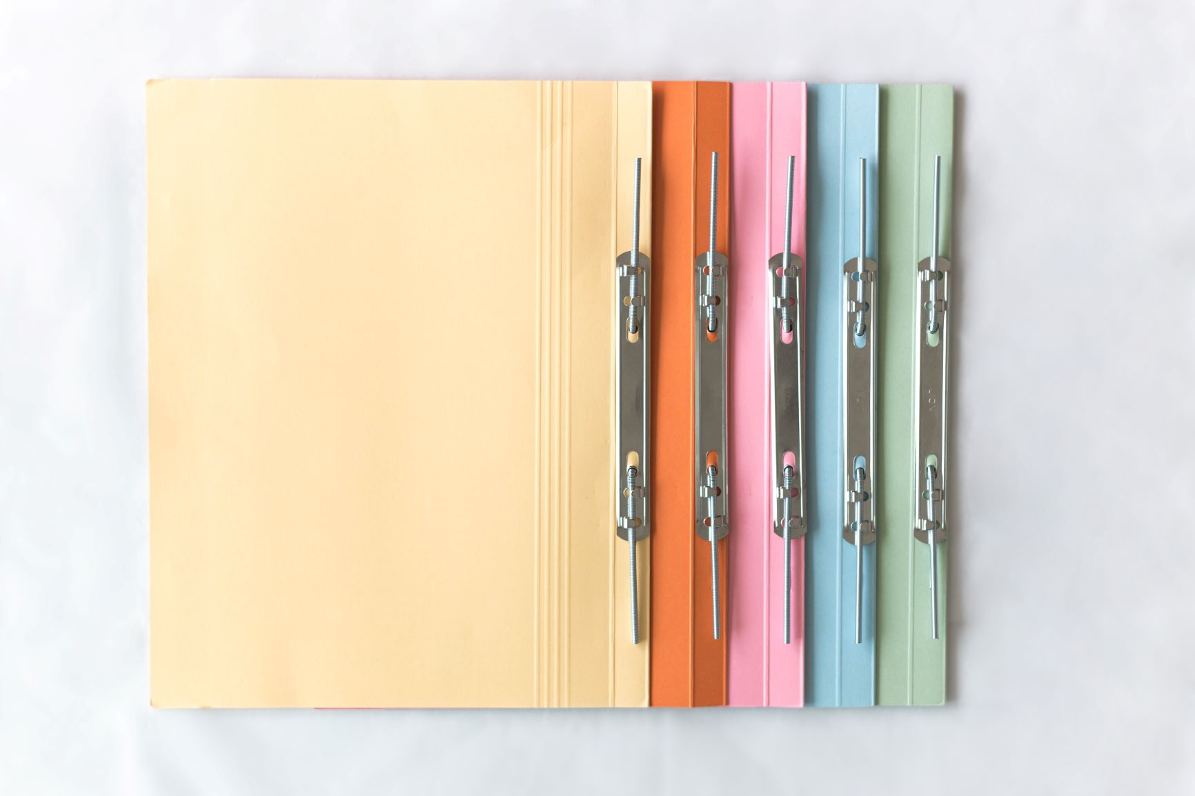 Assorted Colours Lion File Economical (300gsm) Spring Mech. Manila Files. (150 Units Per Carton)